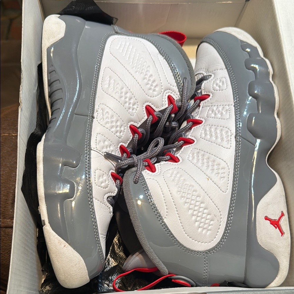 Gray and White Athletic Sneakers with Red Accents